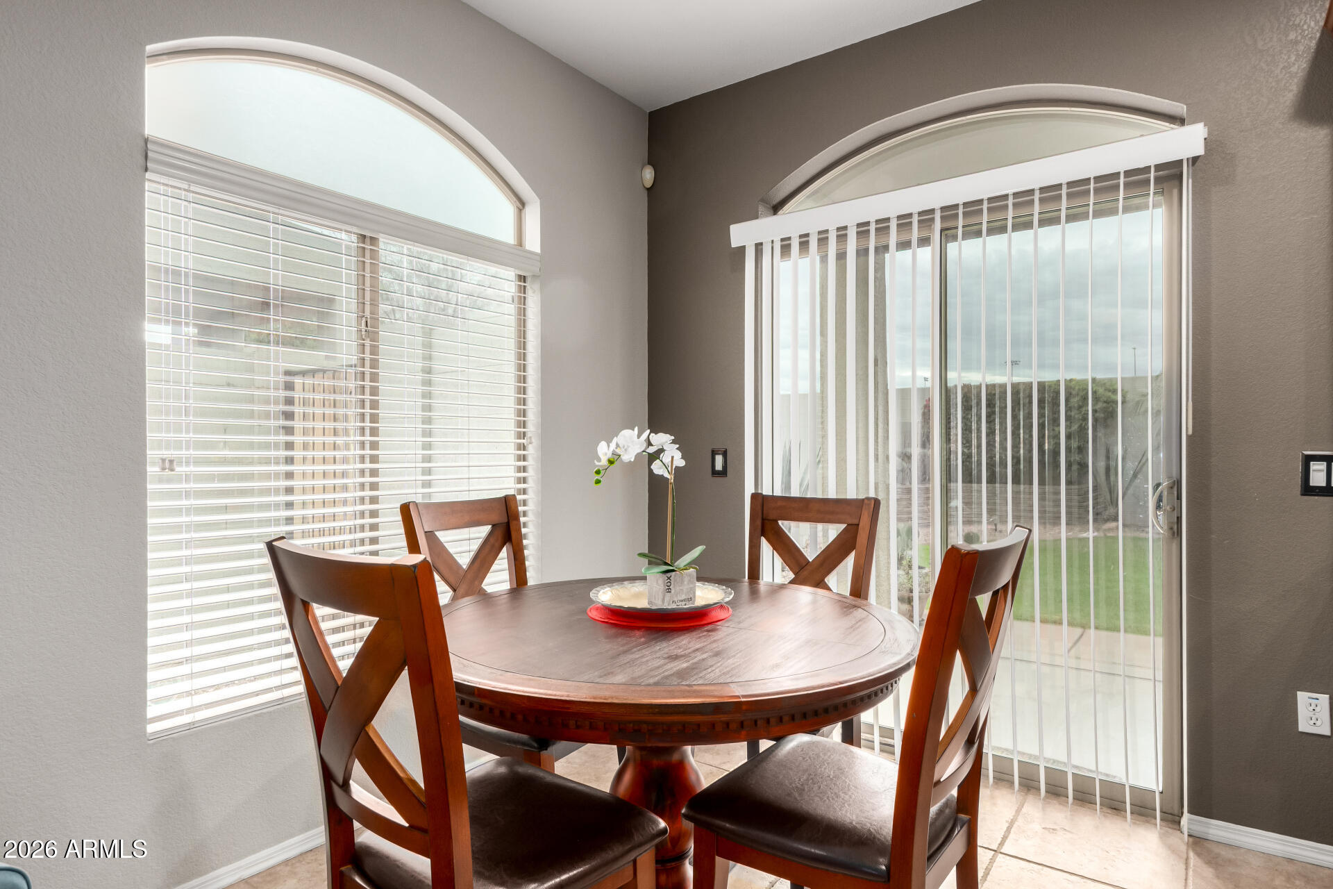 280 South Evergreen Road, Unit 1350 Tempe, AZ 85288 - Photo 12 of 62 a view of a dining room with furniture window and outside view