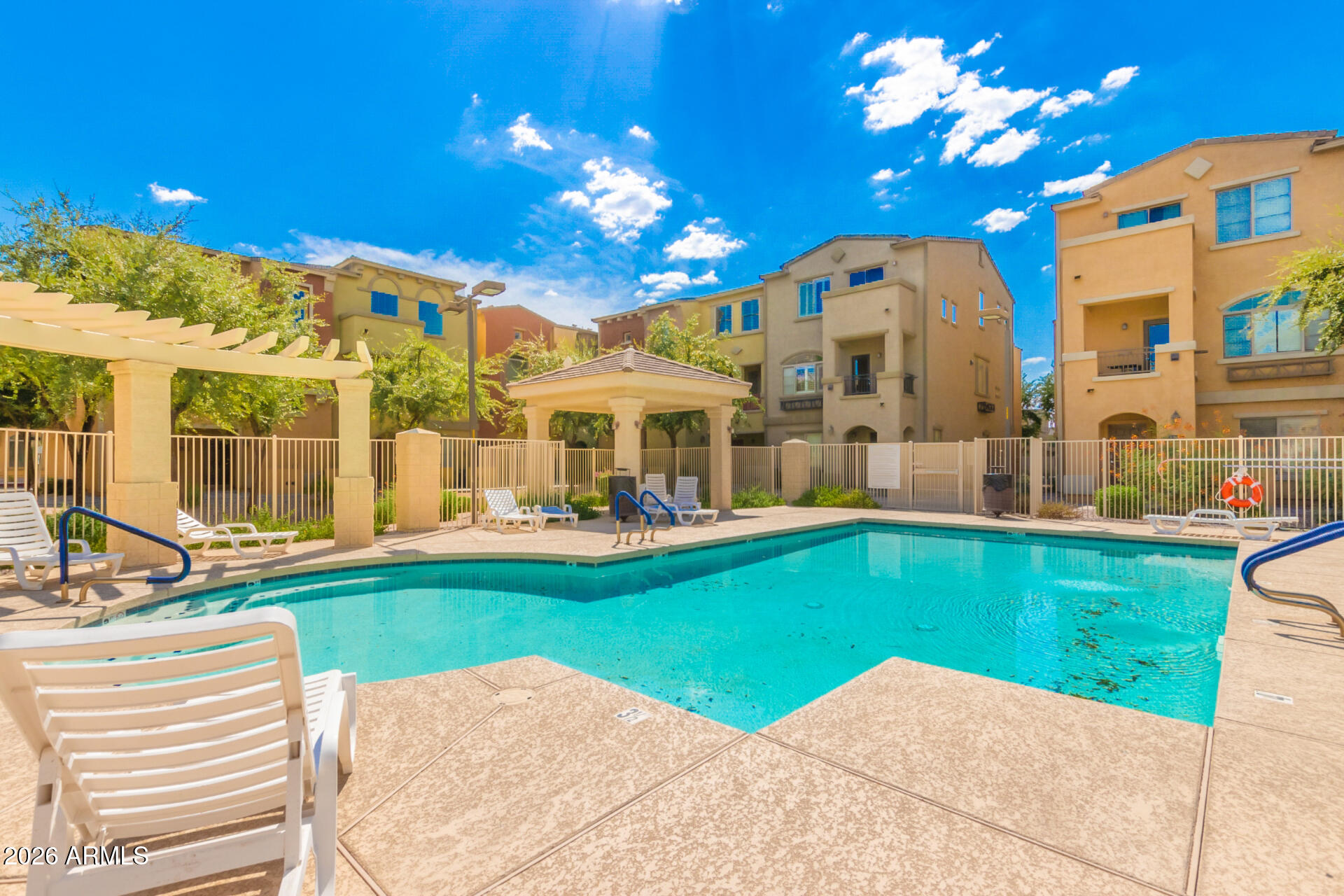 280 South Evergreen Road, Unit 1350 Tempe, AZ 85288 - Photo 50 of 62 a view of a fountain with swimming pool