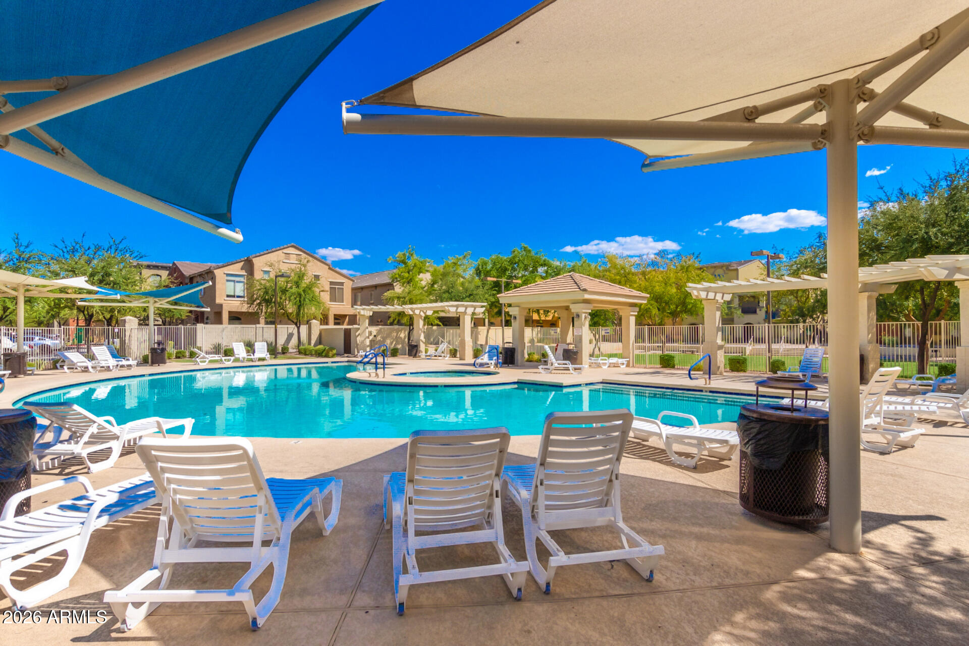 280 South Evergreen Road, Unit 1350 Tempe, AZ 85288 - Photo 55 of 62 a view of a chairs and table in the patio
