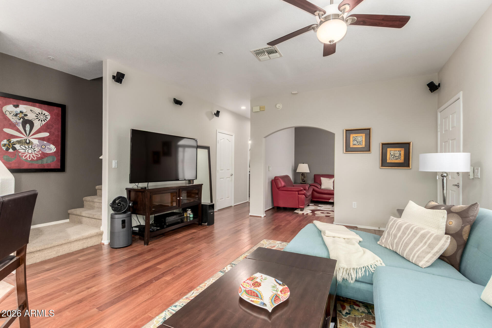 280 South Evergreen Road, Unit 1350 Tempe, AZ 85288 - Photo 10 of 62 a living room with furniture and a flat screen tv