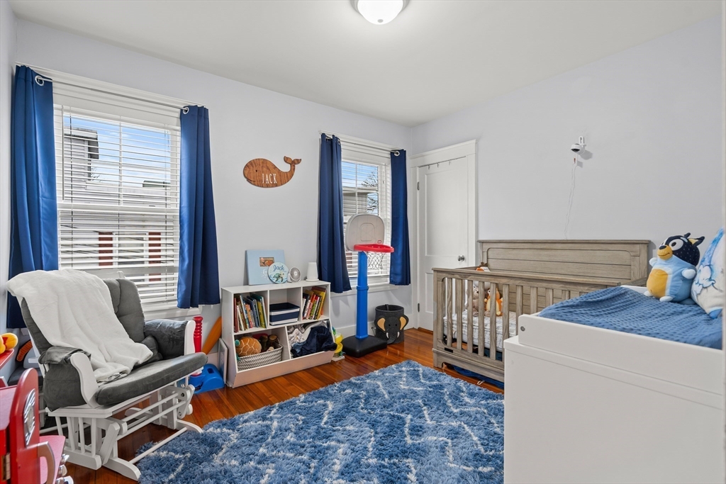 51 New Ocean Street, Unit 2 Swampscott, MA 01907 - Photo 15 of 20 a living room with furniture and a window