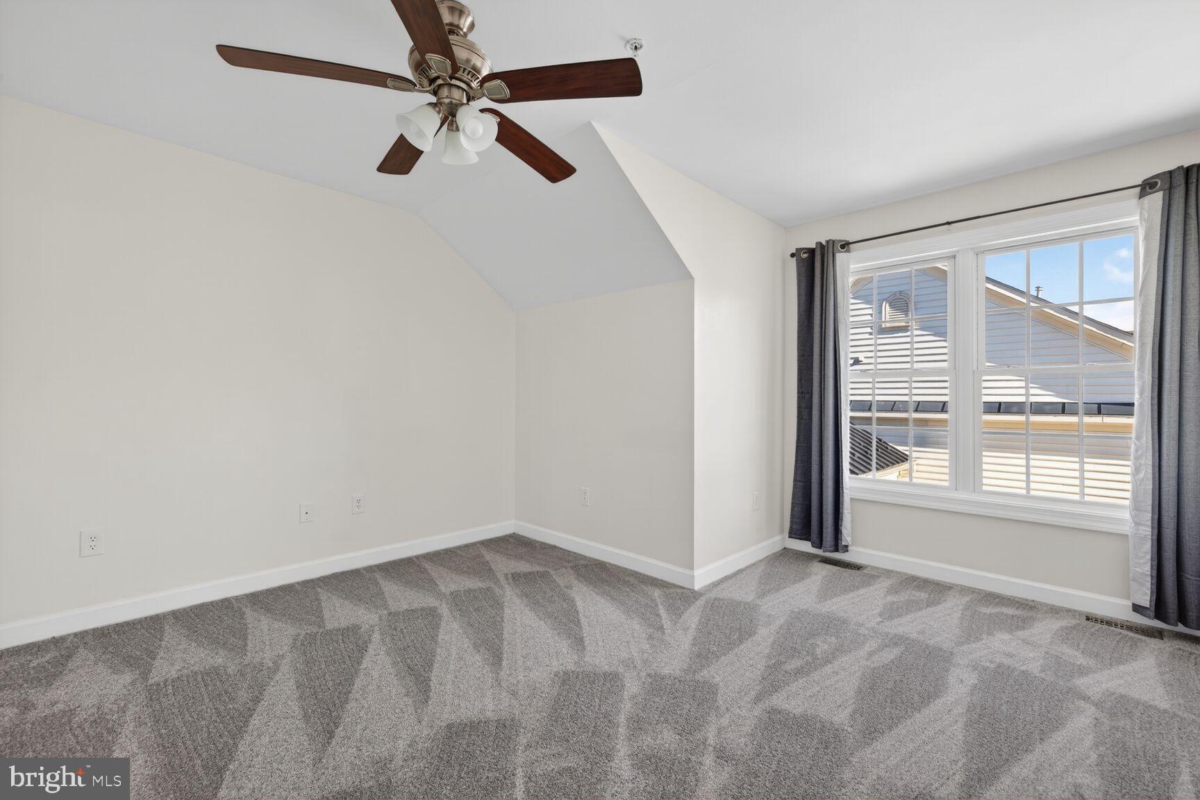 593 Cedar Spring Street Gaithersburg, MD 20877 - Photo 17 of 28 an empty room with windows