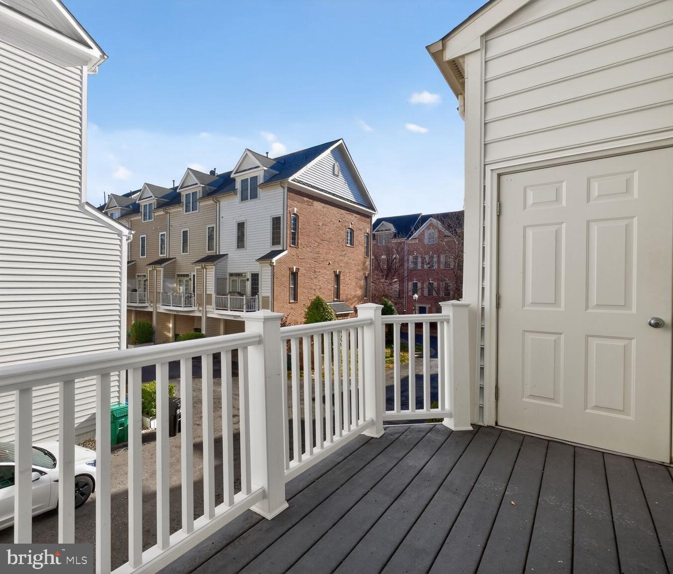 593 Cedar Spring Street Gaithersburg, MD 20877 - Photo 22 of 28 a view of a house with wooden deck