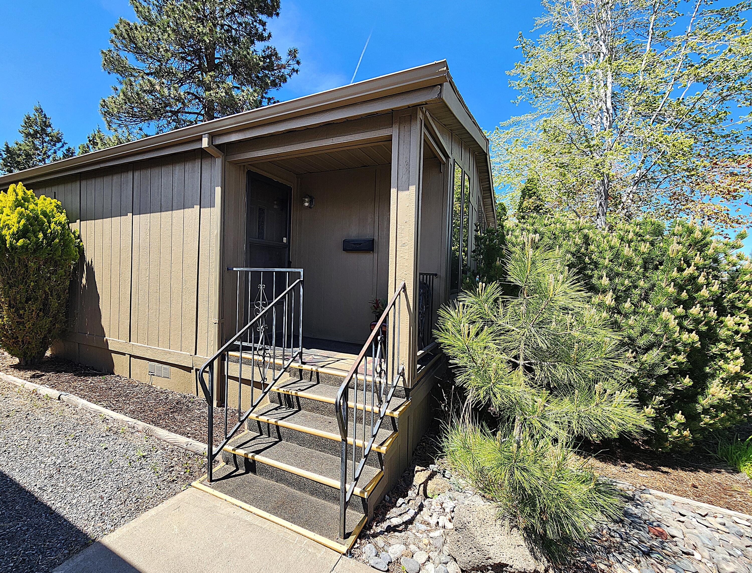 1001 Southeast 15th Street, Unit 34 Bend, OR 97702 - Photo 4 of 43 Small, covered porch at front entrance