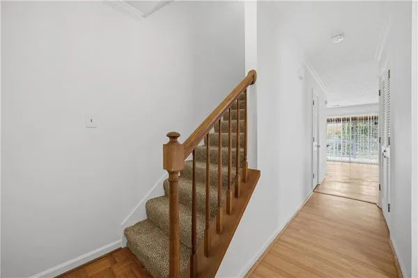 a view of entryway with wooden floor