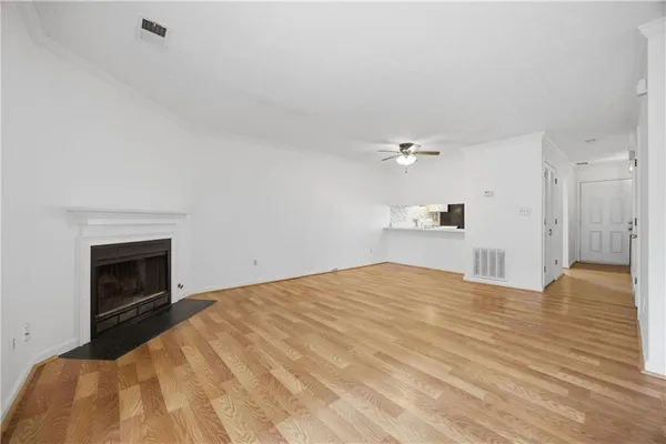 a bedroom with a bed and a fireplace