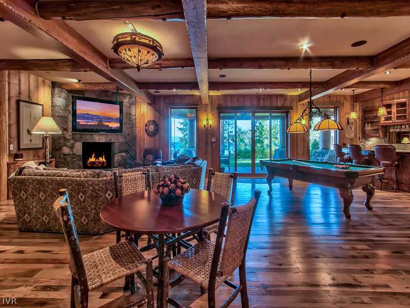 93 Shoreline Circle Incline Village, NV 89451 - Photo 20 of 35 a view of a dining room with furniture one side kitchen view and a chandelier