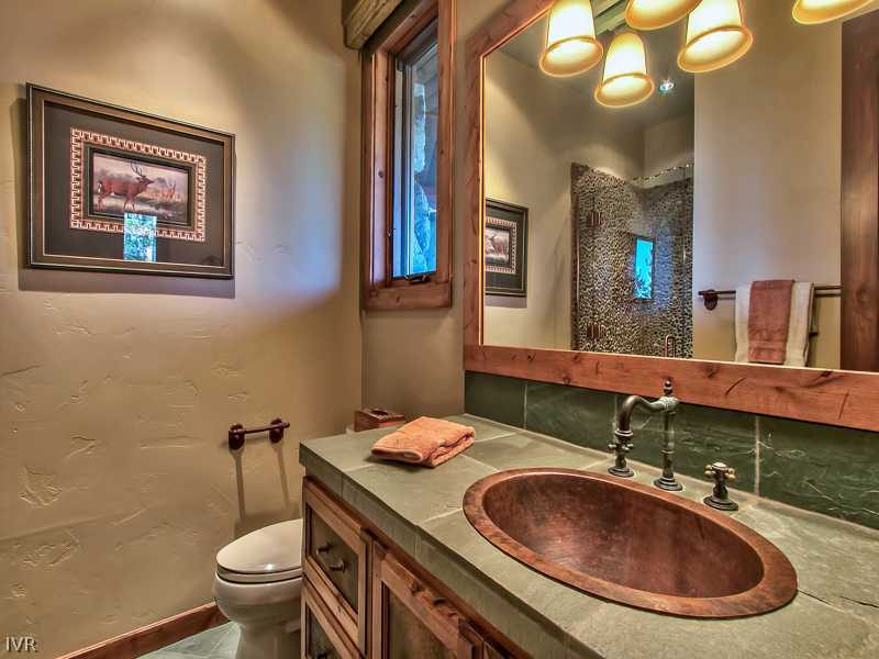 93 Shoreline Circle Incline Village, NV 89451 - Photo 26 of 35 a bathroom with a sink and a mirror