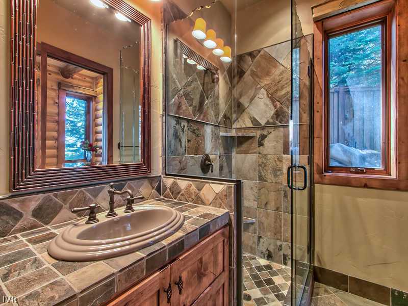 93 Shoreline Circle Incline Village, NV 89451 - Photo 28 of 35 a bathroom with a sink and a mirror