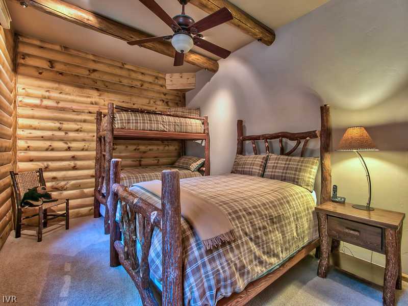 93 Shoreline Circle Incline Village, NV 89451 - Photo 29 of 35 a bed room with a bed and a lamp