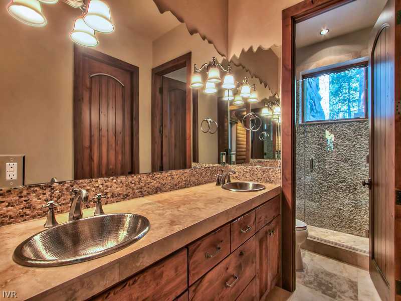 93 Shoreline Circle Incline Village, NV 89451 - Photo 30 of 35 a bathroom with a sink and a mirror