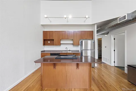 $558,888 | 220 Roslyn Street, Unit 706, Denver, CO 80230
