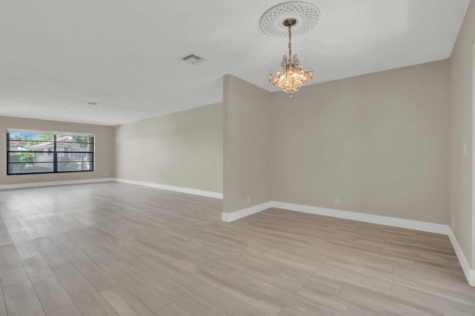 4500 Pandanus Tree Road, Unit A Boynton Beach, FL 33436 - Photo 18 of 36 Living and Dining Area