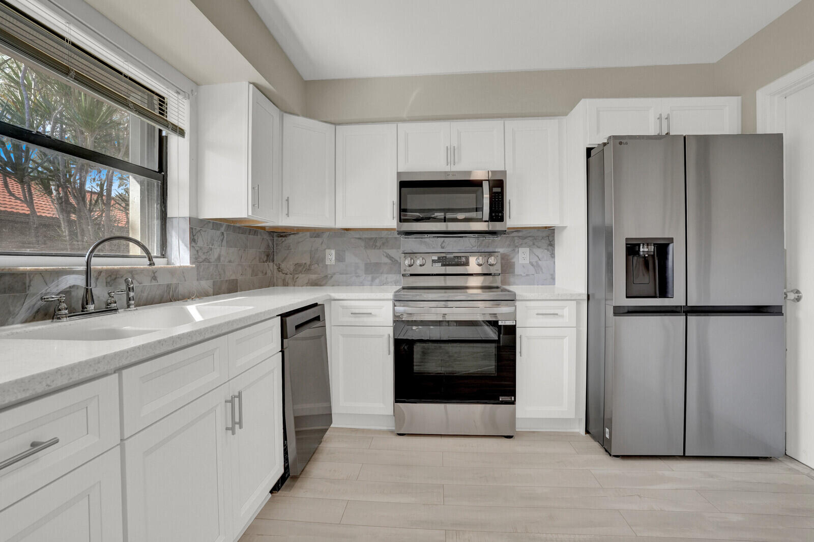 4500 Pandanus Tree Road, Unit A Boynton Beach, FL 33436 - Photo 19 of 36 Kitchen