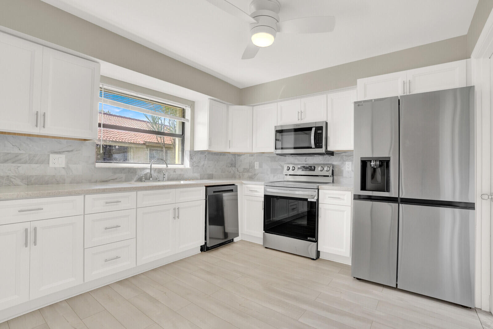 4500 Pandanus Tree Road, Unit A Boynton Beach, FL 33436 - Photo 20 of 36 Kitchen