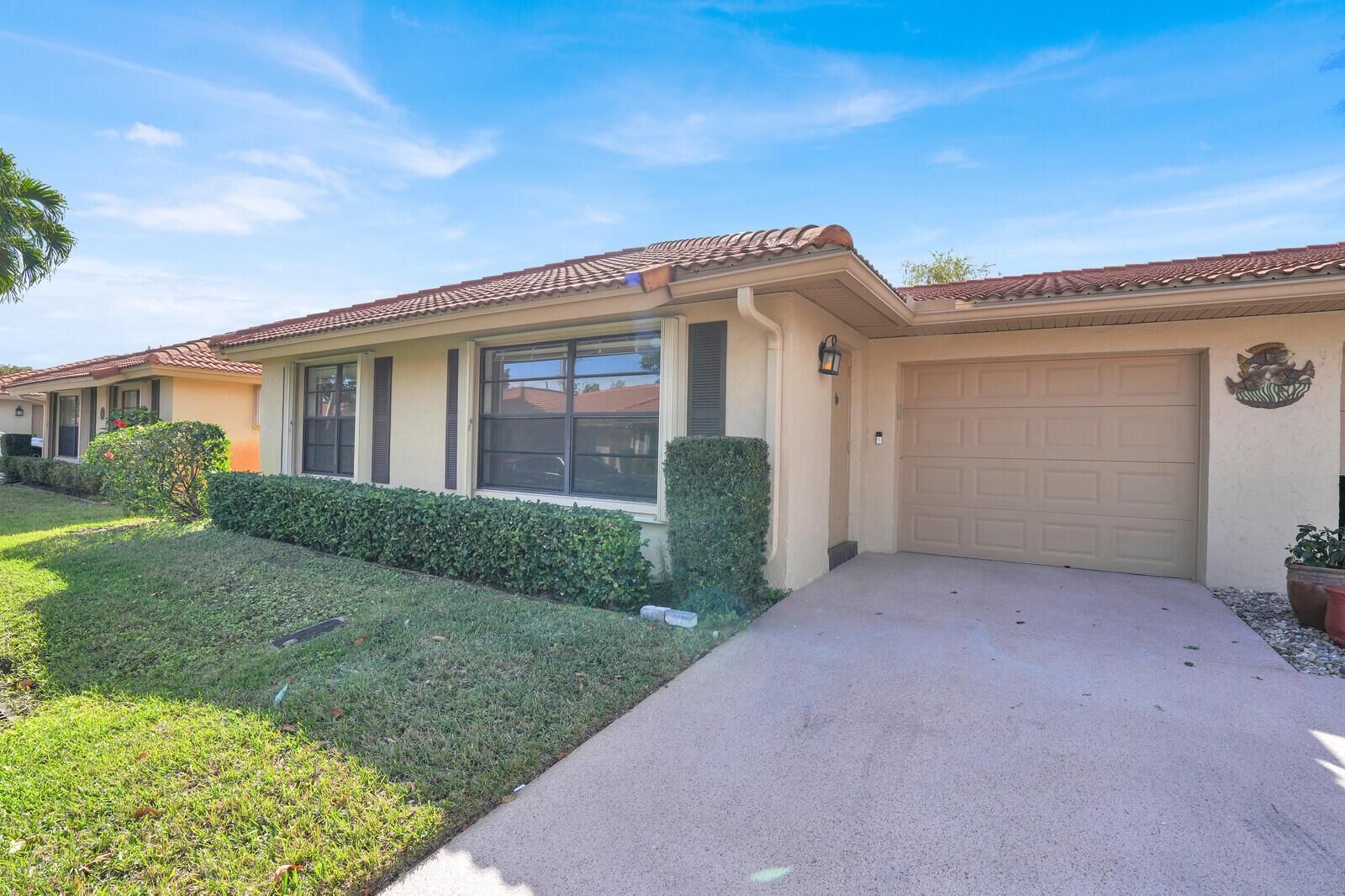 4500 Pandanus Tree Road, Unit A Boynton Beach, FL 33436 - Photo 2 of 36 Front Exterior