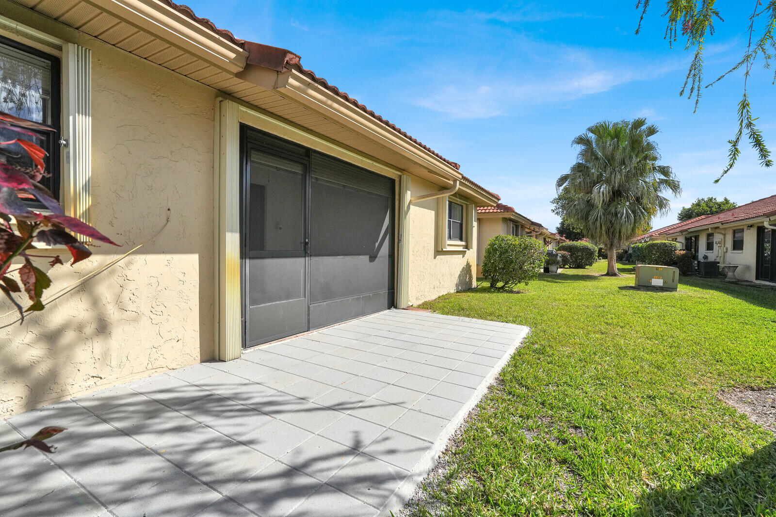 4500 Pandanus Tree Road, Unit A Boynton Beach, FL 33436 - Photo 31 of 36 Rear Exterior