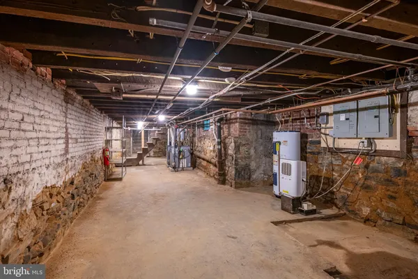 a view of empty room with wooden walls