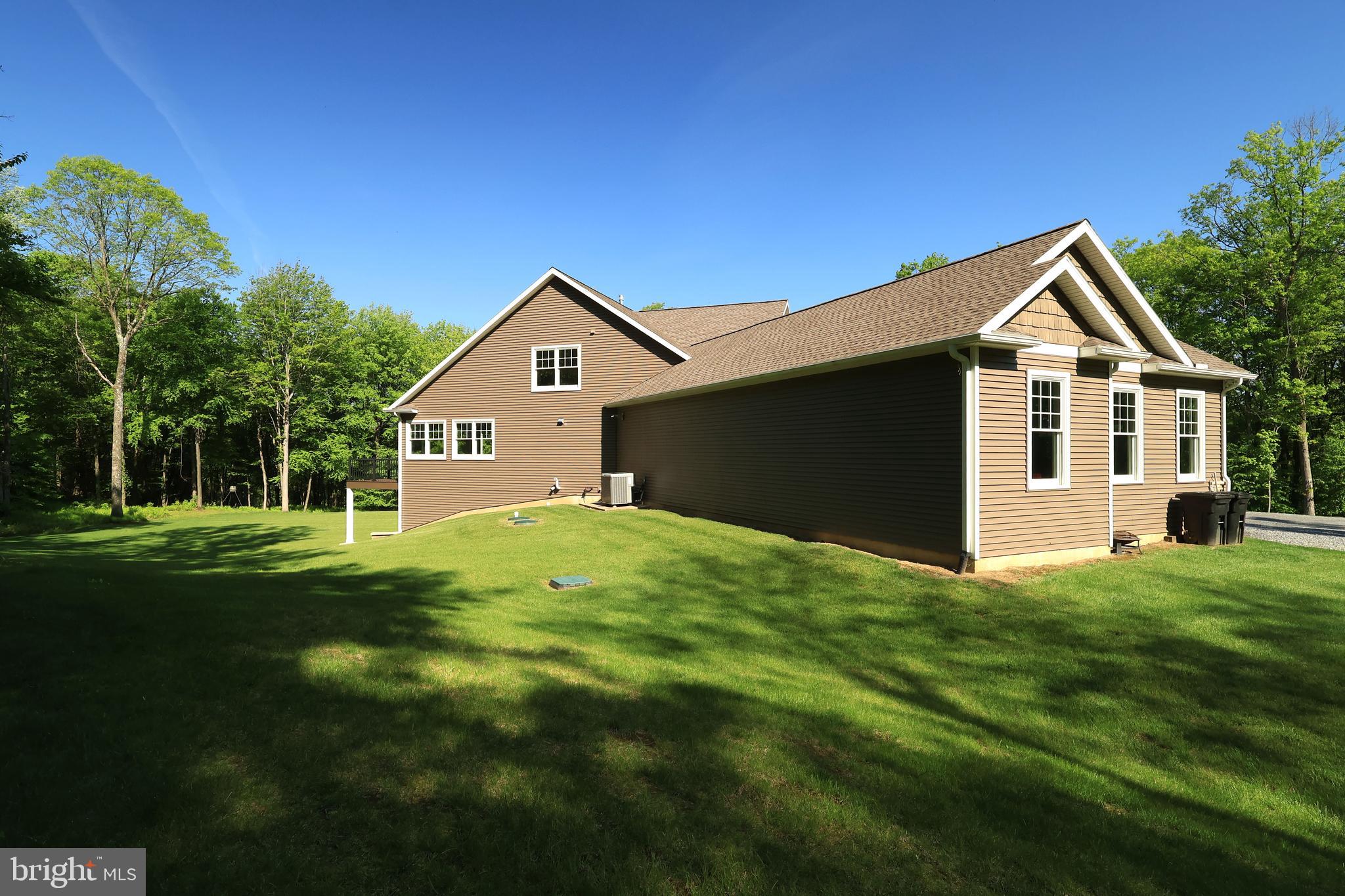 518 Two Mile Road Howard, PA 16841 - Photo 74 of 84 a front view of a house with a yard