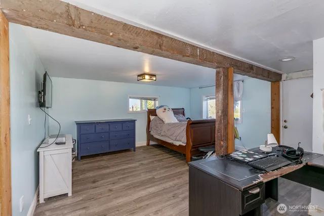 a bathroom with a granite countertop sink mirror and vanity
