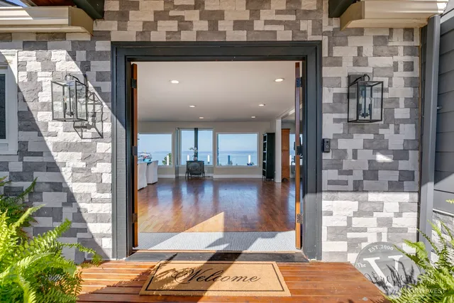 a lobby with furniture and a rug