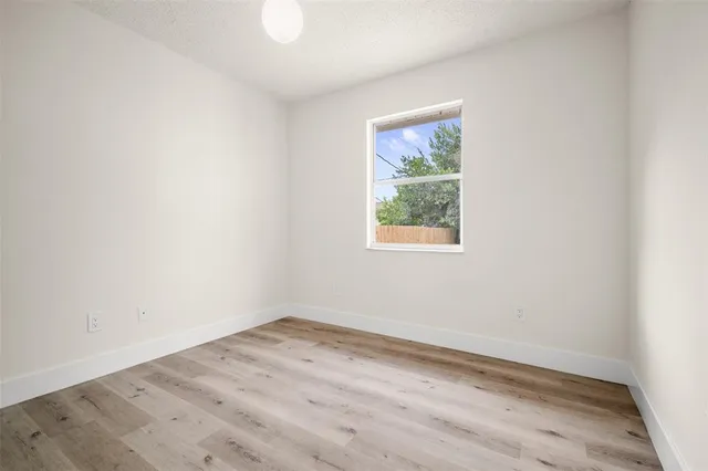 a house with a tree in front of it