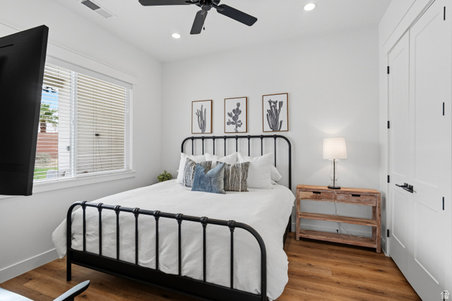 2278 Tawny Ridge Circle St. George, UT 84790 - Photo 33 of 61 Bright interior space featuring wood-finish flooring, a ceiling fan, recessed lighting, and white trim.