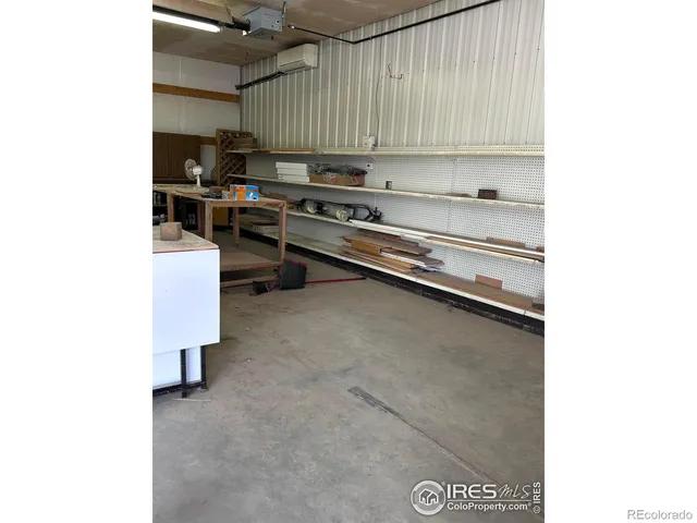 a kitchen with a sink cabinets and appliances