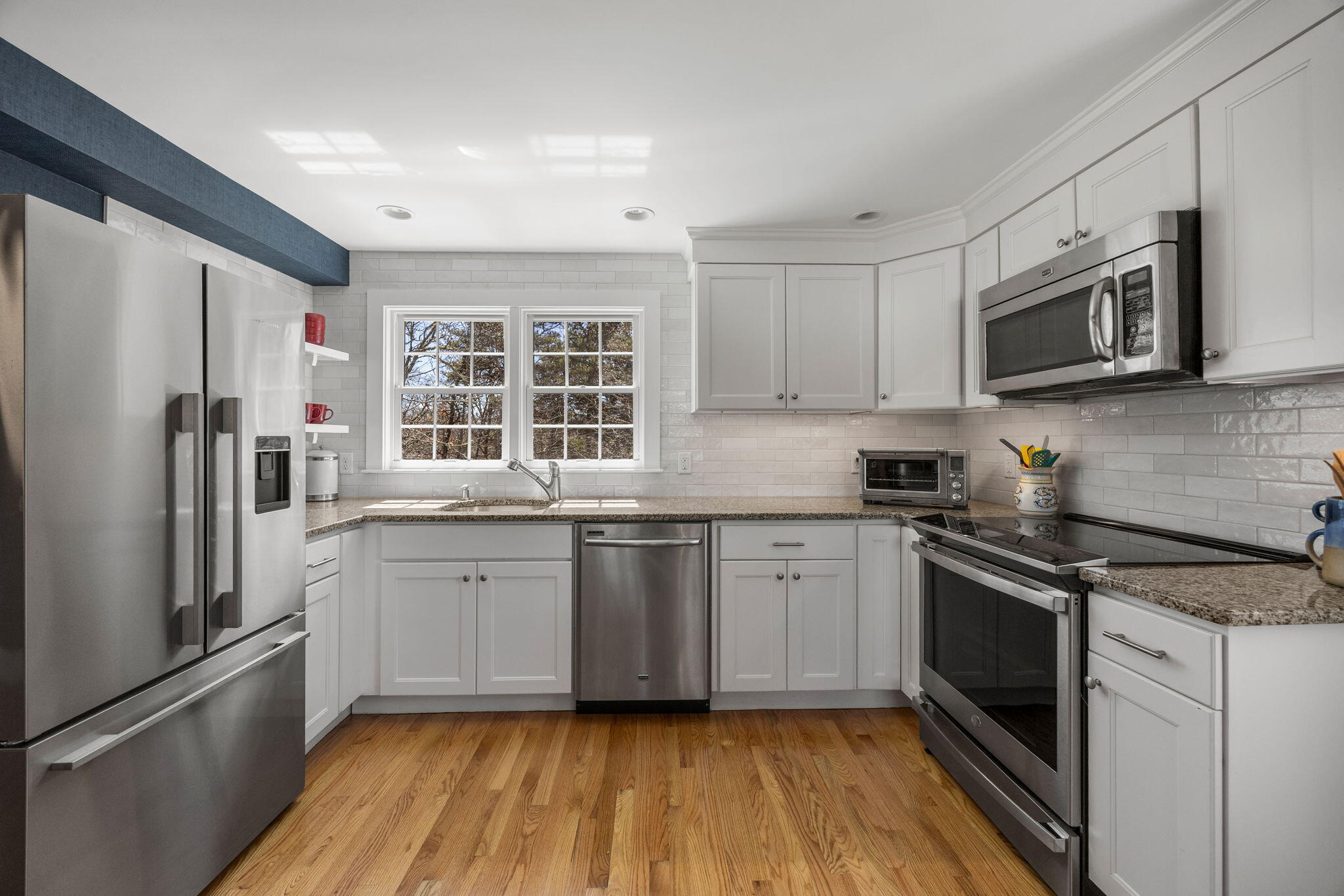 58 Stepping Stones Road Chatham, MA 02633 - Photo 5 of 52 a kitchen with granite countertop a refrigerator stove top oven and sink