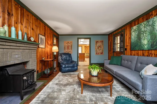 a large kitchen with a large counter top appliances and cabinets
