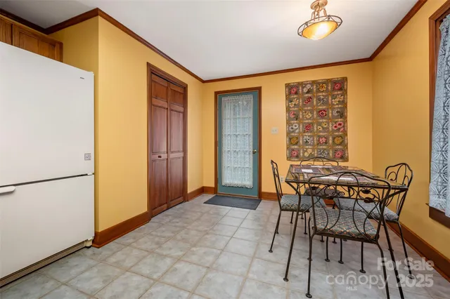 a view of storage and utility room with stairs