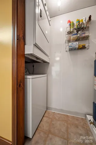 a bedroom with a large bed and a large window