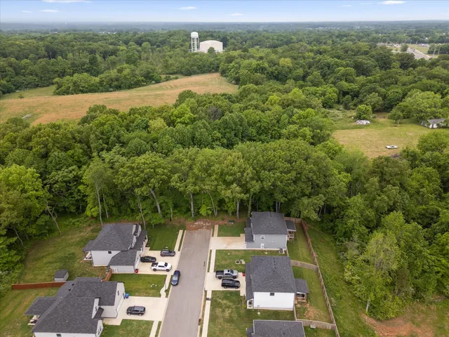 an aerial view of residential house with outdoor space