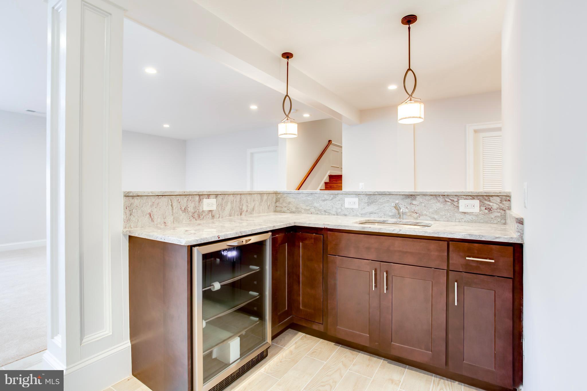 1928 Griffith Road Falls Church, VA 22043 - Photo 25 of 30 Wet bar with wine fridge