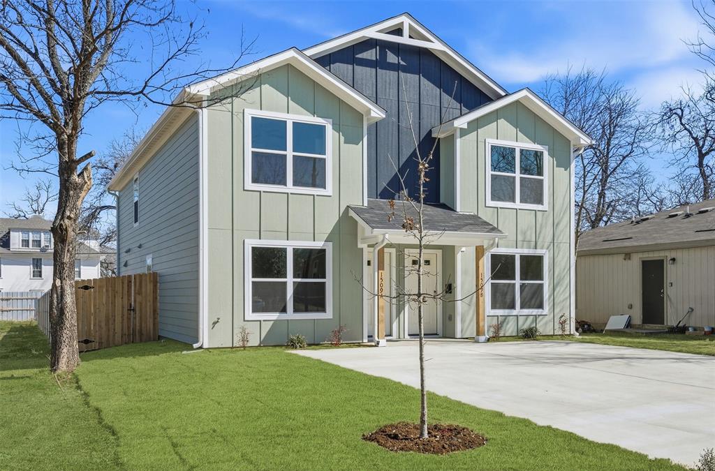 1536 Alexander Avenue, Unit A & B Waco, TX 76708 - Photo 2 of 31 The property features a two-story facade with light green siding and a contrasting dark blue vertical siding accent