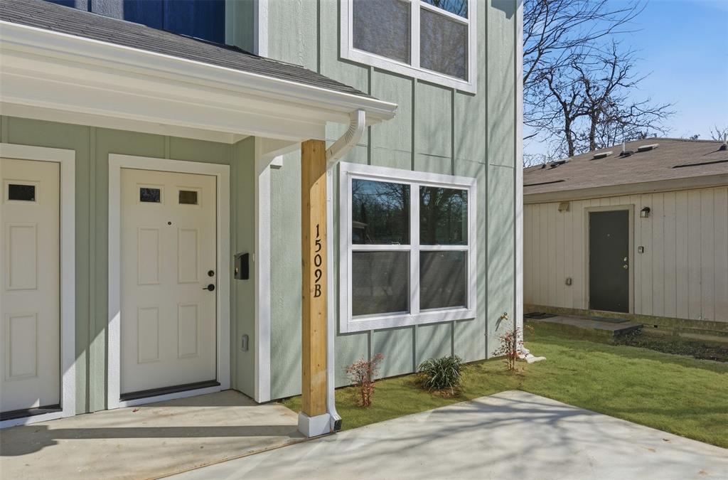 1536 Alexander Avenue, Unit A & B Waco, TX 76708 - Photo 4 of 31 The property features a light green exterior with white trim, a white front door, and a concrete patio area
