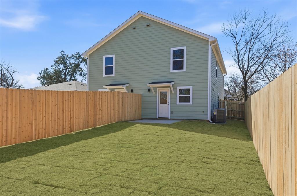 1536 Alexander Avenue, Unit A & B Waco, TX 76708 - Photo 7 of 31 The property features a spacious rear yard with a freshly laid lawn and a privacy fence