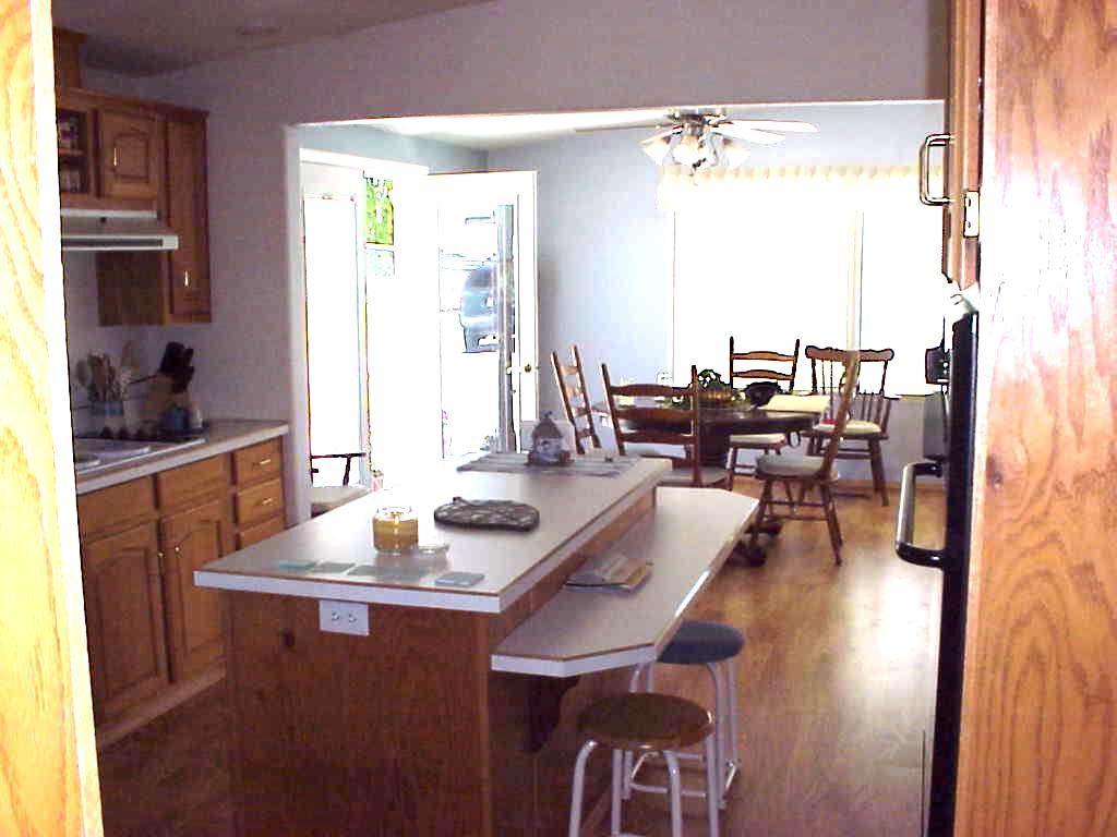 8803 Mieras Road Yakima, WA 98901 - Photo 4 of 7 KITCHEN AND DINING AREA