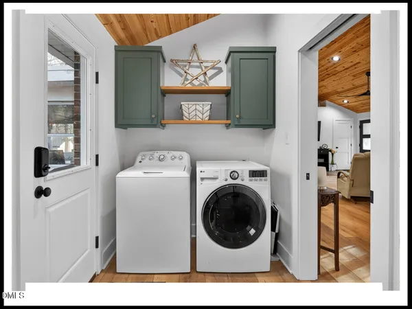 a view of a house with washer and dryer