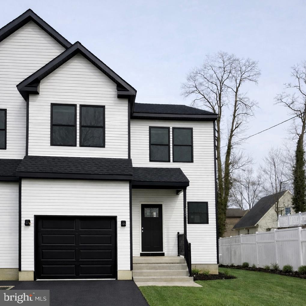 415 Almonesson Road Blackwood, NJ 08012 - Photo 1 of 26 a front view of a house with a yard