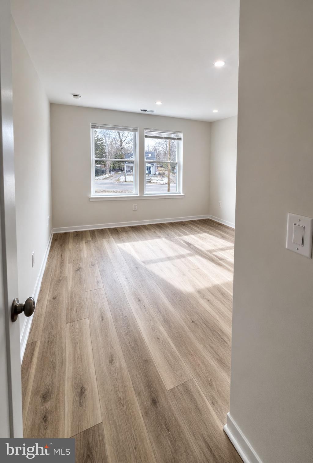 415 Almonesson Road Blackwood, NJ 08012 - Photo 11 of 26 wooden floor in an empty room with a window
