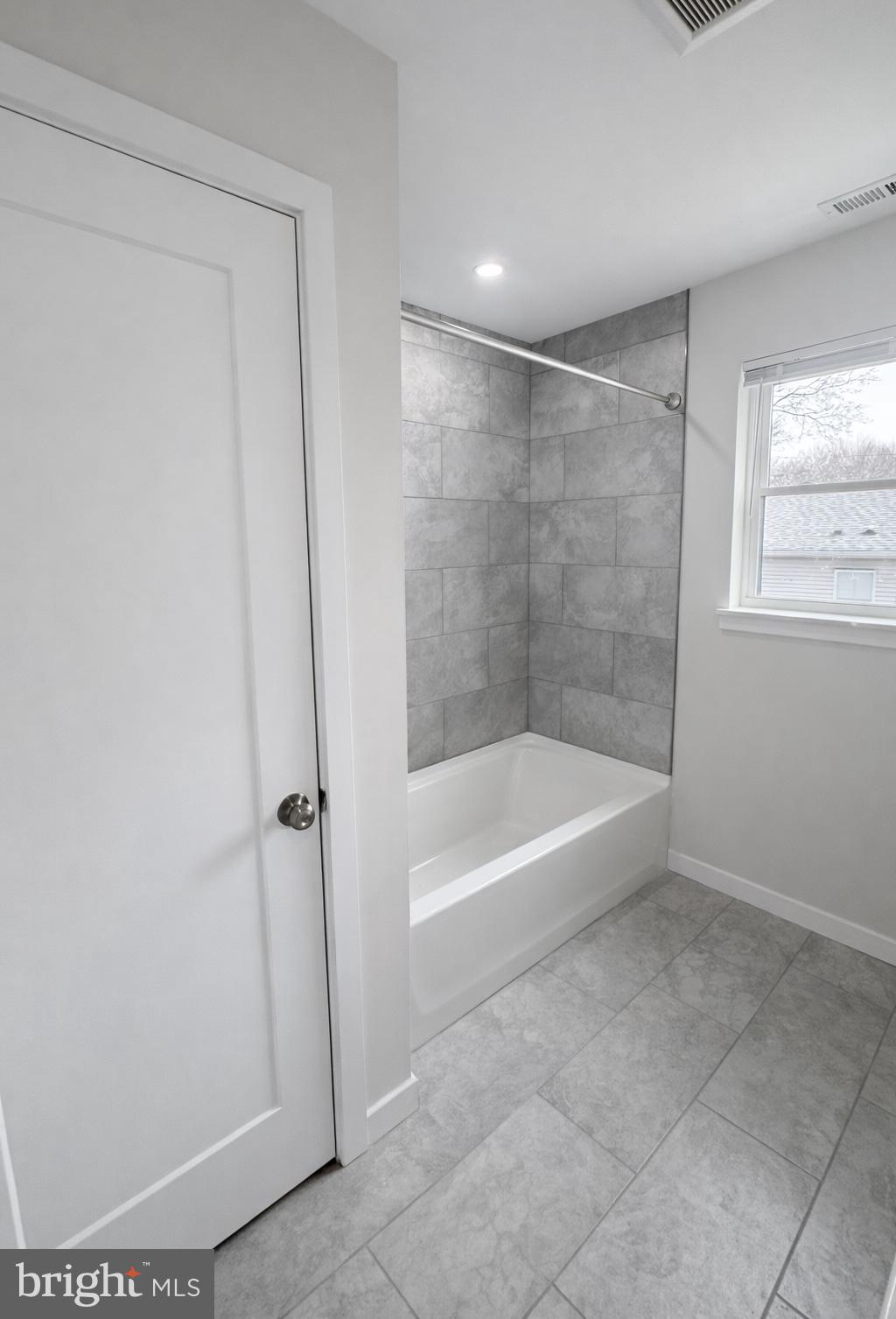 415 Almonesson Road Blackwood, NJ 08012 - Photo 15 of 26 a bathroom with a shower and a bath tub