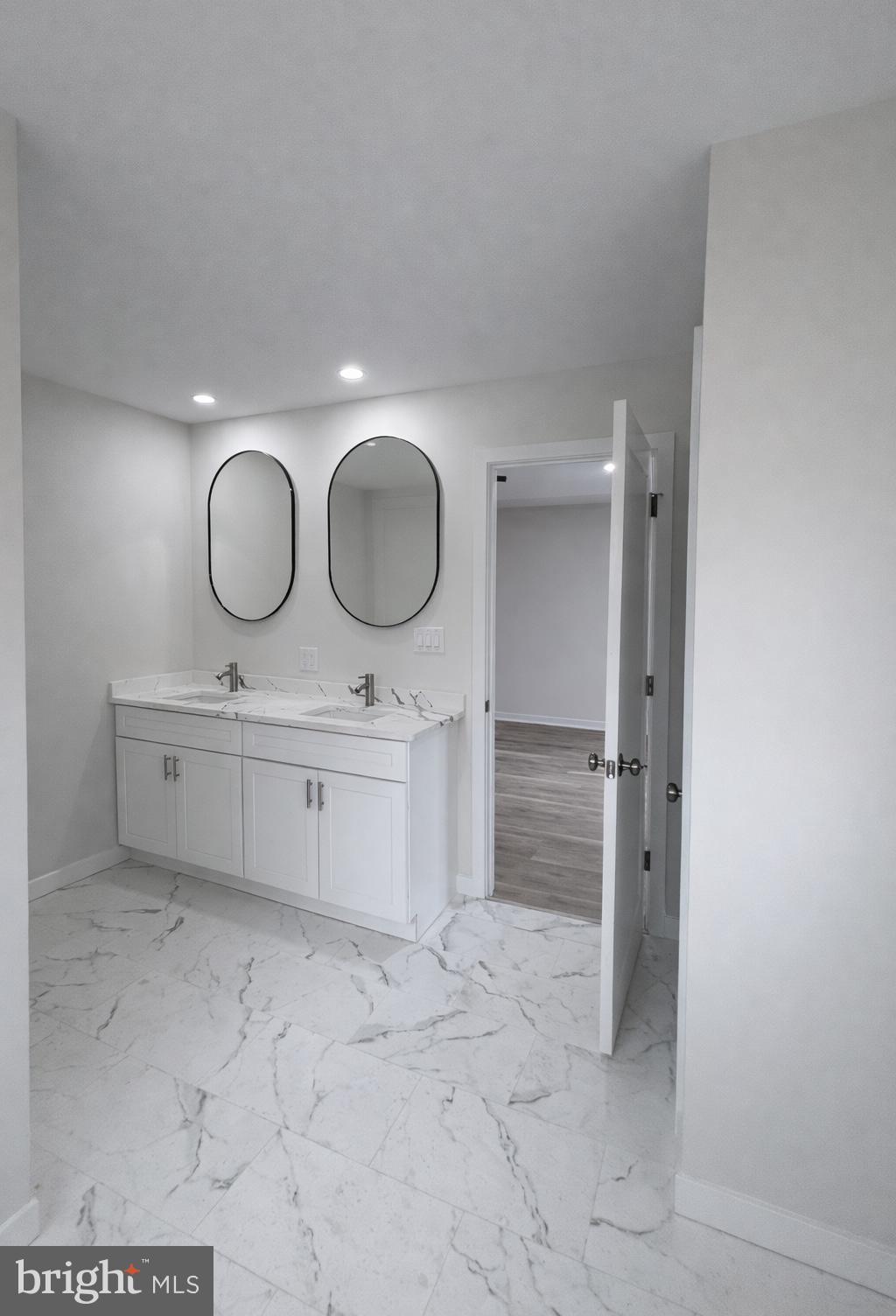 415 Almonesson Road Blackwood, NJ 08012 - Photo 21 of 26 a bathroom with a double vanity sink mirror and toilet