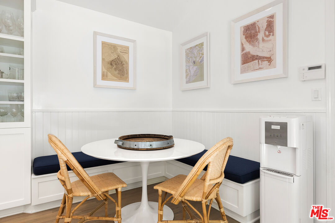3404 Merrimac Road Los Angeles, CA 90049 - Photo 13 of 29 a view of a dining room with furniture and wooden floor