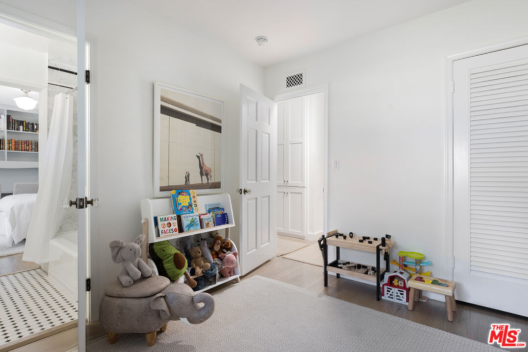 3404 Merrimac Road Los Angeles, CA 90049 - Photo 23 of 29 a living room with furniture and a window
