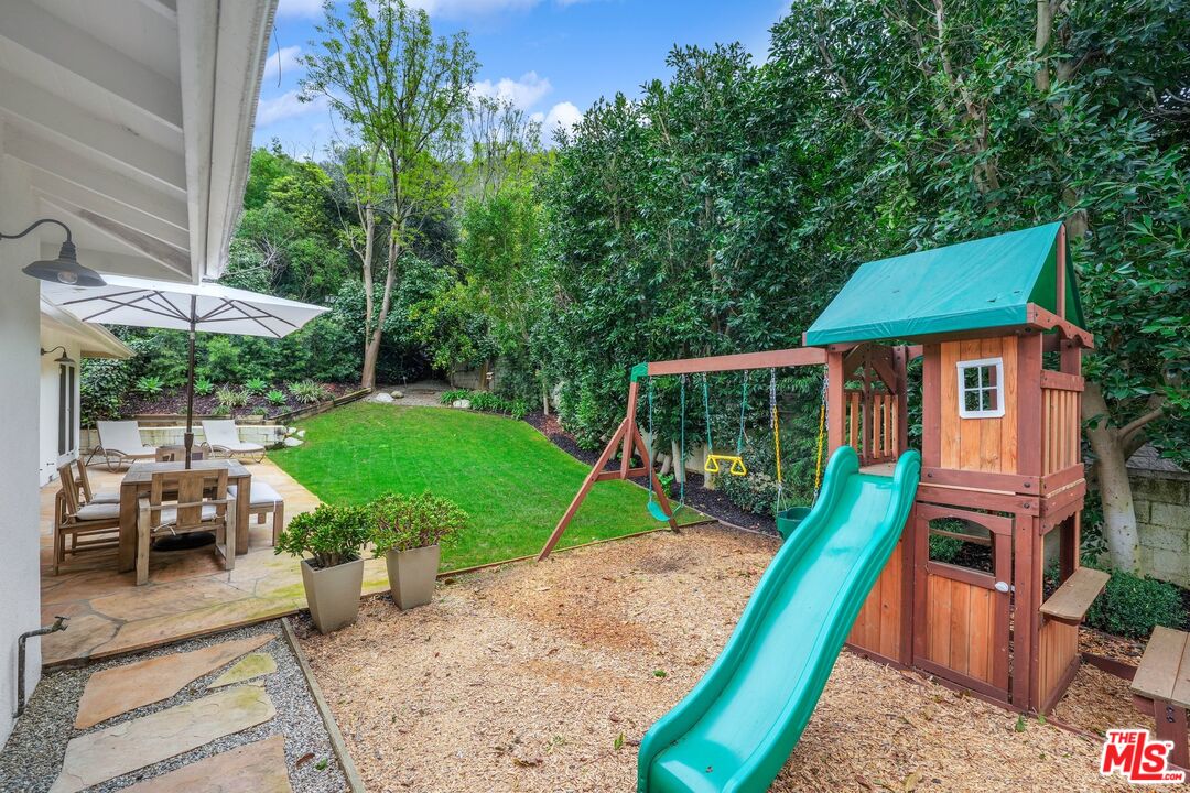 3404 Merrimac Road Los Angeles, CA 90049 - Photo 27 of 29 an aerial view of a house with swimming pool and furniture