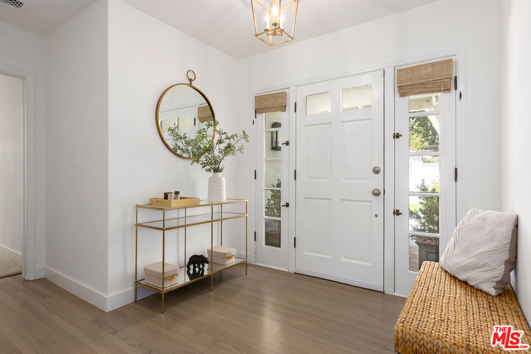 3404 Merrimac Road Los Angeles, CA 90049 - Photo 4 of 29 a view of an entryway with wooden floor