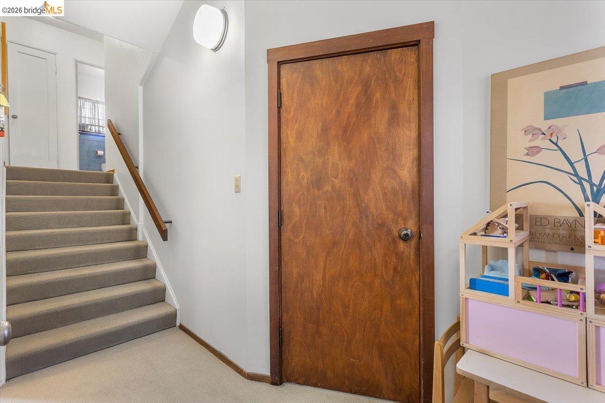 2702 Dana Street Berkeley, CA 94705 - Photo 12 of 37 a view of entryway with wooden floor and stairs