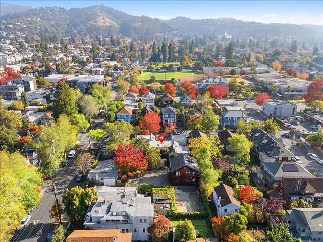 a view of a city with lots of trees