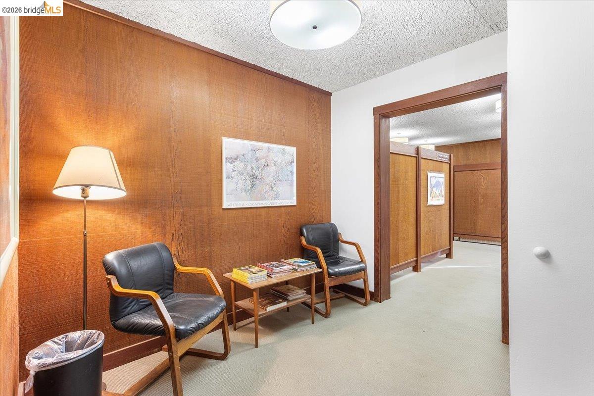 2702 Dana Street Berkeley, CA 94705 - Photo 7 of 37 a workspace with furniture and lamp